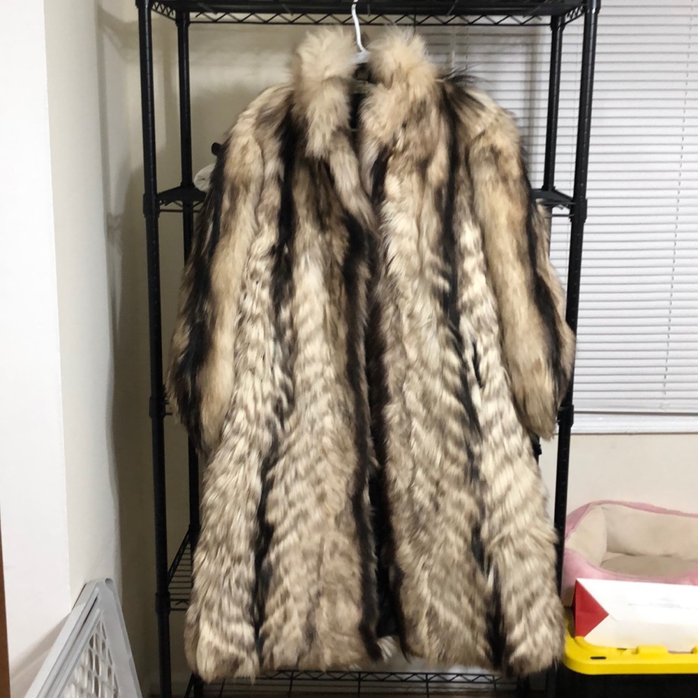 Faux Fur coat made in China. Size medium.
